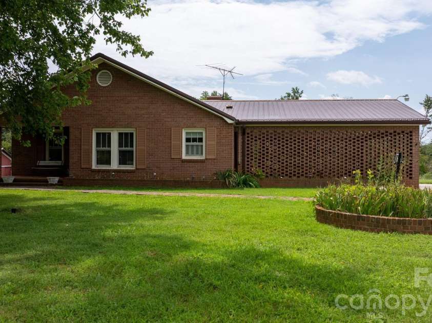 316 Drexel Road, Morganton, NC 28655.  MLS# CAR4414904, YatesRealty ID 3633. Front of home and yard