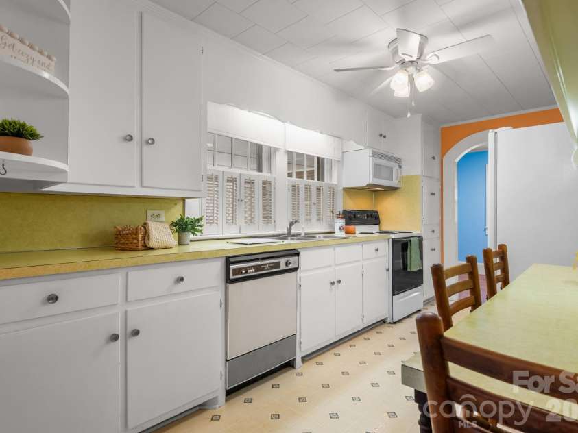 316 Drexel Road, Morganton, NC 28655.  MLS# CAR4414904, YatesRealty ID 3633. RETRO kitchen with white cabinets...cute as can be!! All appliances remaining.