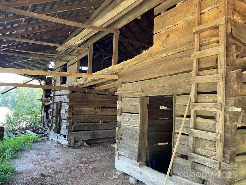 8725 Bringle Ferry Road, Salisbury, NC 28146.  MLS# CAR4218468, YatesRealty ID 3633. Ladder to hay loft at right