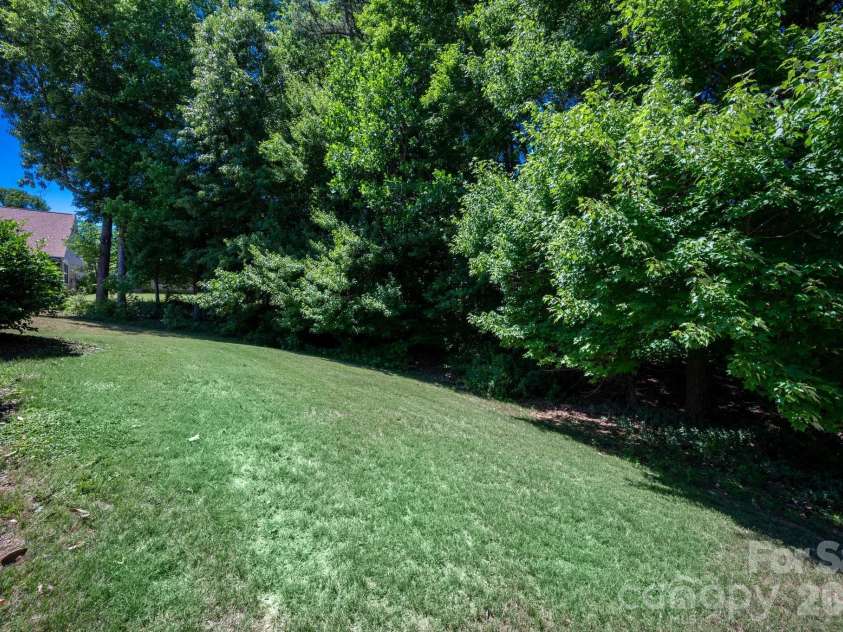 1265 Hamburg Court, Waxhaw, NC 28173.  MLS# CAR4382070, YatesRealty ID 36336. Backyard
