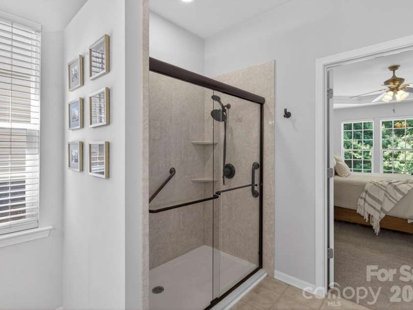 1265 Hamburg Court, Waxhaw, NC 28173.  MLS# CAR4382070, YatesRealty ID 36336. Large walk-in shower