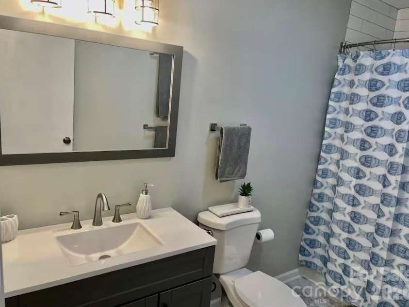155 Quail Cove Boulevard, Lake Lure, NC 28746.  MLS# CAR4354303, YatesRealty ID 3634. 