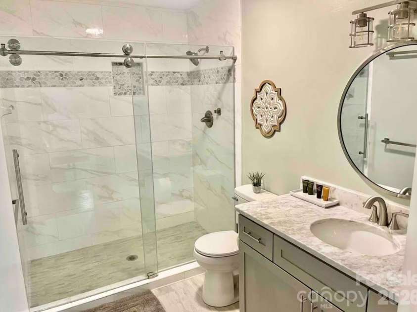 155 Quail Cove Boulevard, Lake Lure, NC 28746.  MLS# CAR4386792, YatesRealty ID 3634. 
