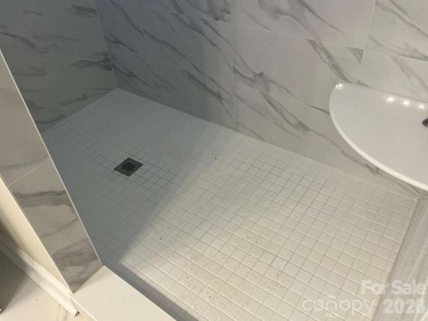 456 Allen Drive, Concord, NC 28027.  MLS# CAR4400128, YatesRealty ID 36359. Primary Tile Shower