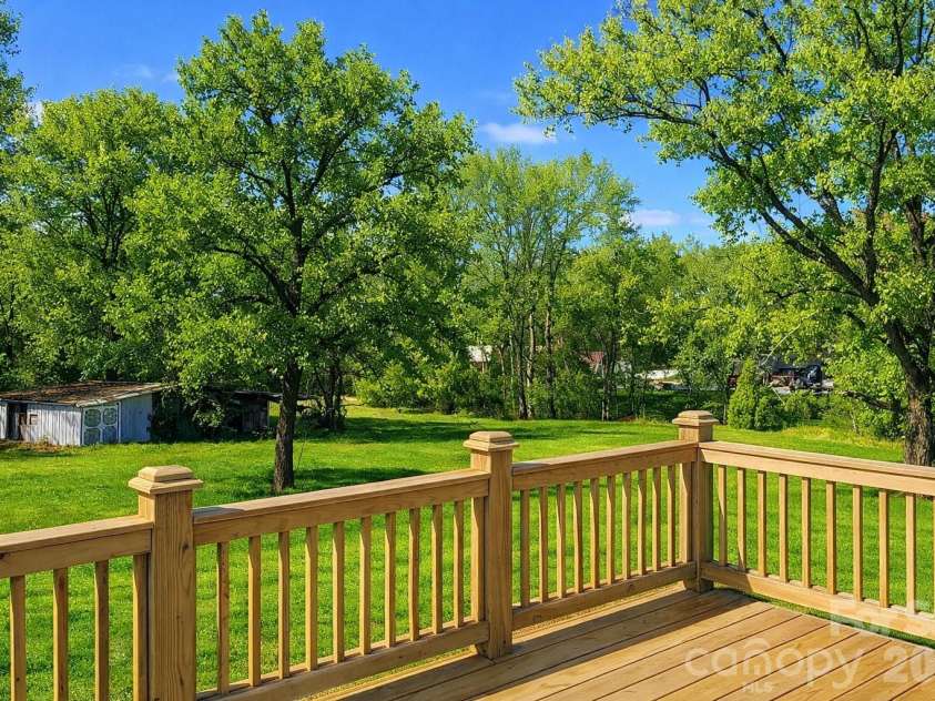 456 Allen Drive, Concord, NC 28027.  MLS# CAR4400128, YatesRealty ID 36359. Rear Deck Overlooks Flat Backyard