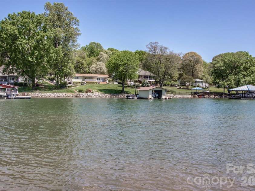 4265 Candlewood Drive, Sherrills Ford, NC 28673.  MLS# CAR4350411, YatesRealty ID 3636. Enjoy the picturesque setting, and easy access to the lake, making it ideal for those who enjoy a tranquil lakeside lifestyle.