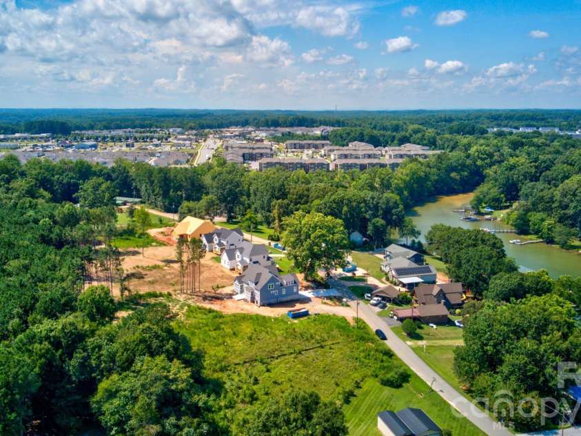 4265 Candlewood Drive, Sherrills Ford, NC 28673.  MLS# CAR4350411, YatesRealty ID 3636. Nestled within this peaceful community, this property provides an exceptional opportunity to enjoy both the tranquility of the surroundings and the serene views that enhance the overall living experience.
