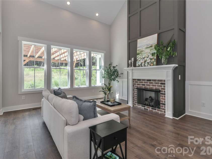 4265 Candlewood Drive, Sherrills Ford, NC 28673.  MLS# CAR4350411, YatesRealty ID 3636. The stunning and cozy gas fireplace anchors the living room with warmth and elegance.