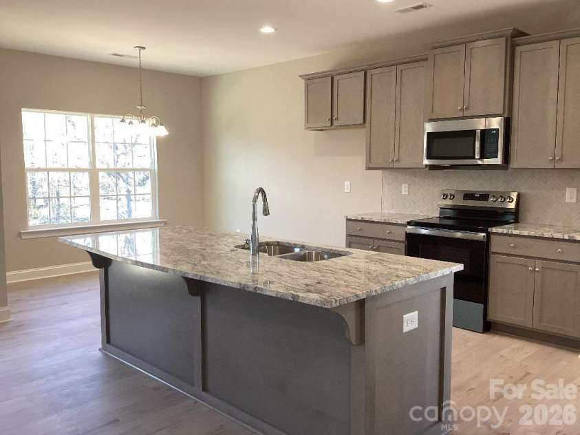 458 Allen Drive, Concord, NC 28027.  MLS# CAR4399612, YatesRealty ID 36360. Breakfast Area