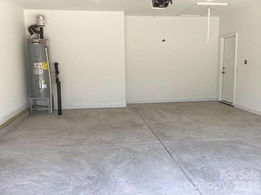 458 Allen Drive, Concord, NC 28027.  MLS# CAR4399612, YatesRealty ID 36360. Finished Garage