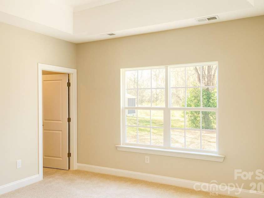 458 Allen Drive, Concord, NC 28027.  MLS# CAR4399612, YatesRealty ID 36360. Primary BR with Trey Ceiling