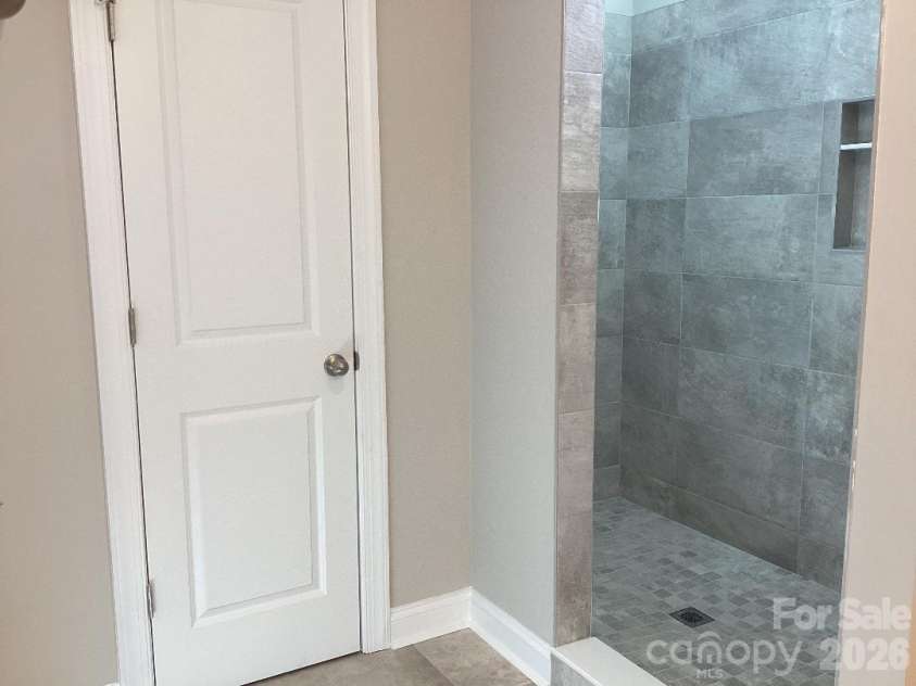 458 Allen Drive, Concord, NC 28027.  MLS# CAR4399612, YatesRealty ID 36360. Walk-In Tile Shower & Pan