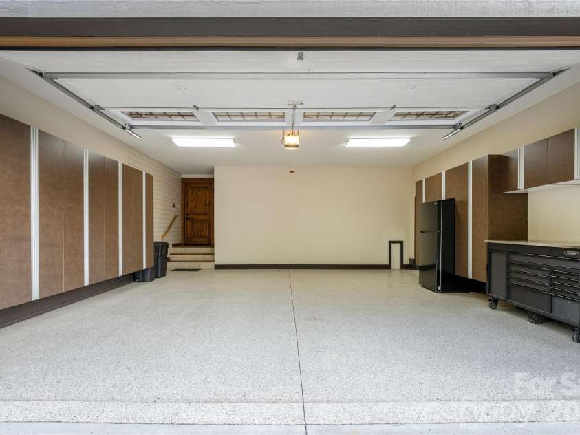 345 Prospect Drive, Burnsville, NC 28714.  MLS# CAR4399945, YatesRealty ID 36378. Attached garage with custom cabinets