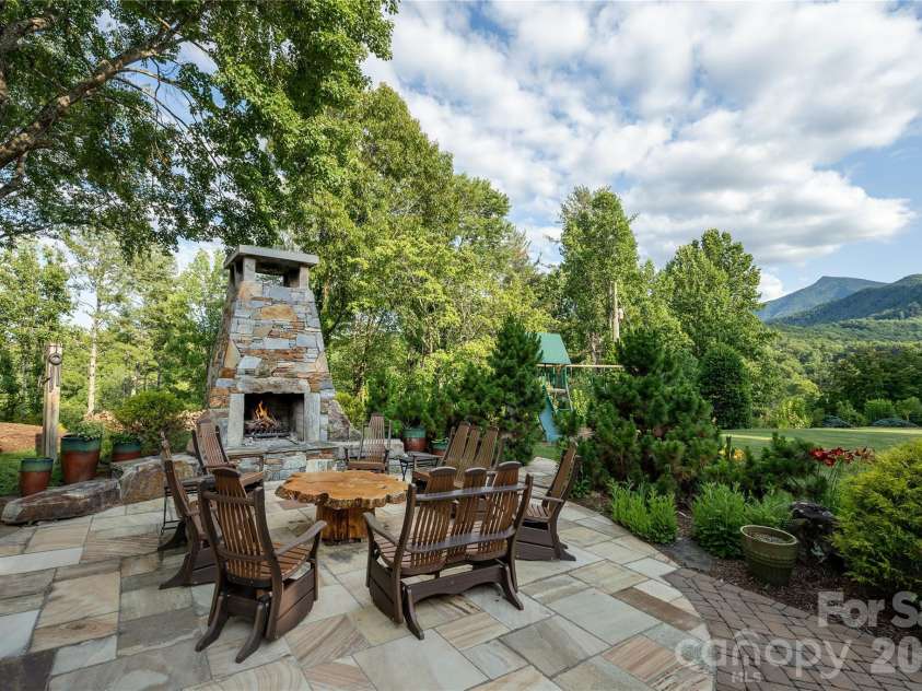 345 Prospect Drive, Burnsville, NC 28714.  MLS# CAR4399945, YatesRealty ID 36378. Outdoor firepit