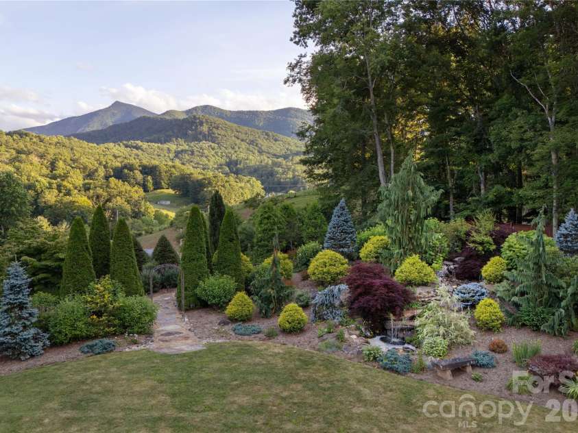345 Prospect Drive, Burnsville, NC 28714.  MLS# CAR4399945, YatesRealty ID 36378. Yard with view