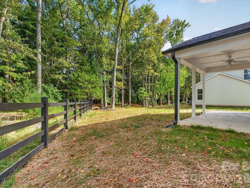 4919 Potter Road, Matthews, NC 28104.  MLS# CAR4395738, YatesRealty ID 36381. 