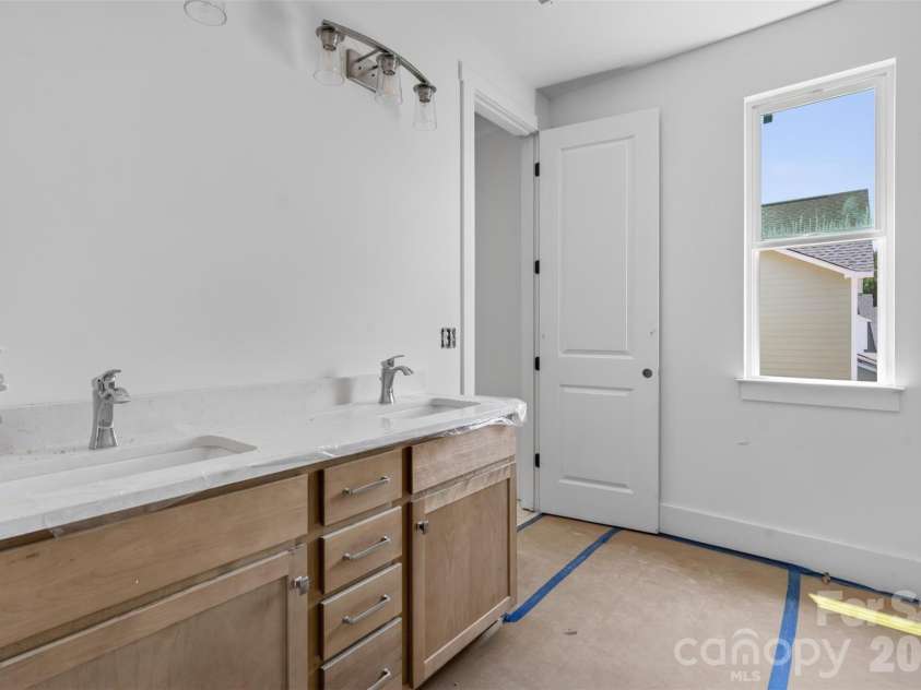 4919 Potter Road, Matthews, NC 28104.  MLS# CAR4395738, YatesRealty ID 36381. Primary Bath-Mirrors will be installed.
