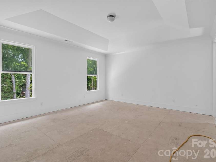 4919 Potter Road, Matthews, NC 28104.  MLS# CAR4395738, YatesRealty ID 36381. Primary Suite  overlooking private backyard!