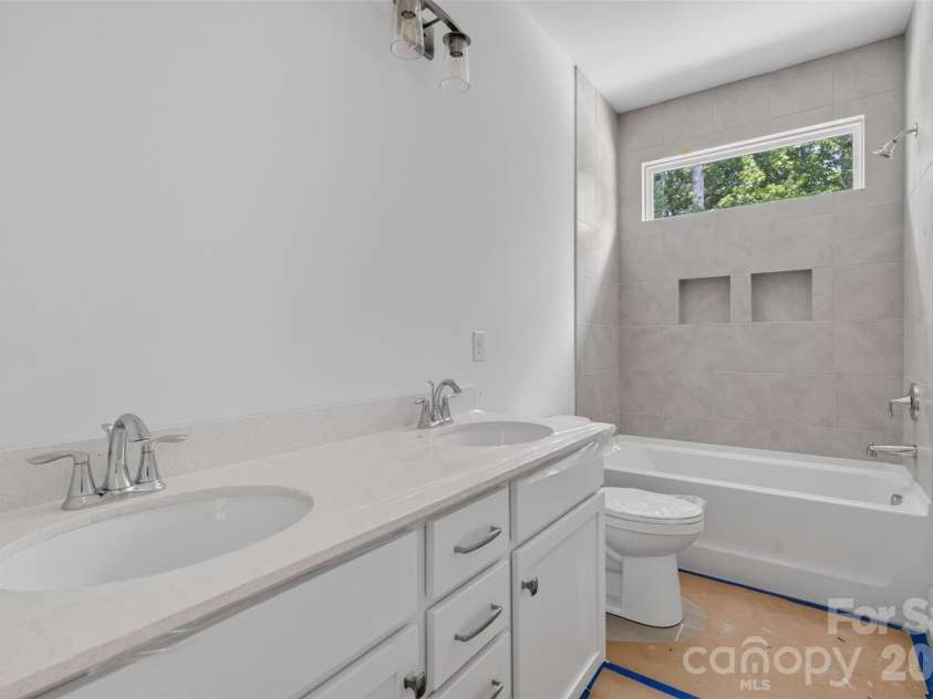 4919 Potter Road, Matthews, NC 28104.  MLS# CAR4395738, YatesRealty ID 36381. Secondary Bathroom-Mirrors will be installed