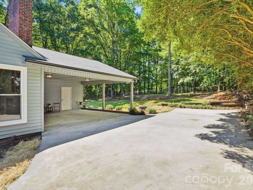 1927 Terra Lane, Lancaster, SC 29720.  MLS# CAR4379834, YatesRealty ID 36389. Side Entry Carport