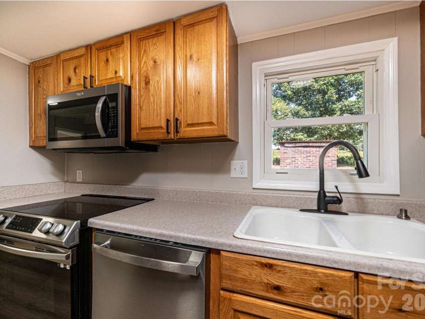 1143 Cheyenne Oaks Drive, Claremont, NC 28610.  MLS# CAR4398648, YatesRealty ID 36390. 