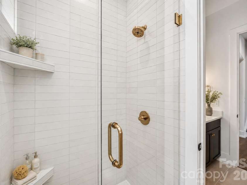 7207 Benita Drive, Charlotte, NC 28212.  MLS# CAR4389589, YatesRealty ID 36393. Representative photo- Full bathroom on the main floor
