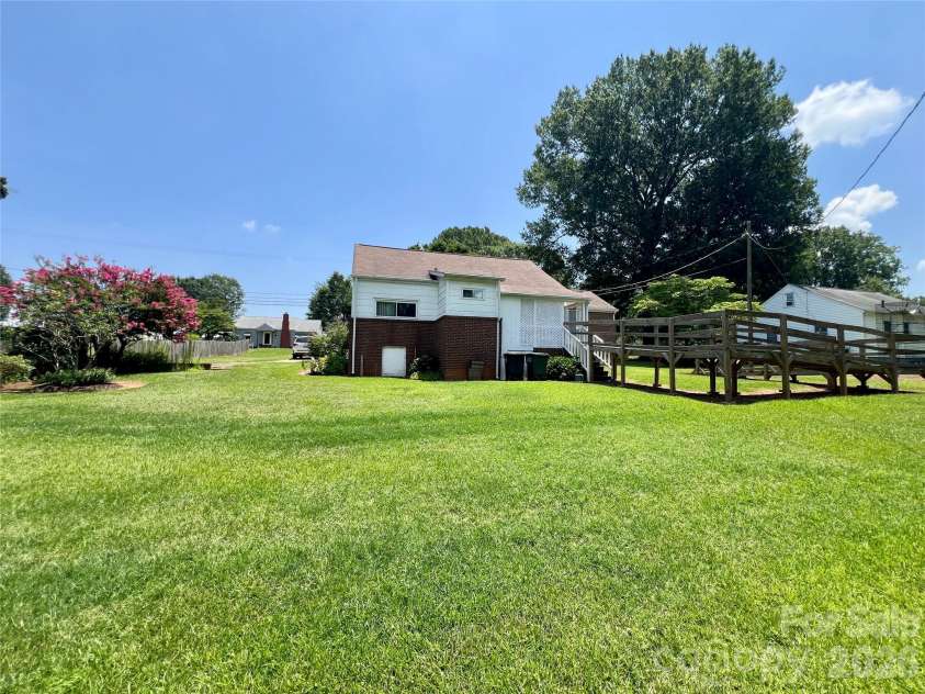 2307 Mclean Street, Gastonia, NC 28054.  MLS# CAR4402528, YatesRealty ID 36421. Green like value!  Backyard heaven.