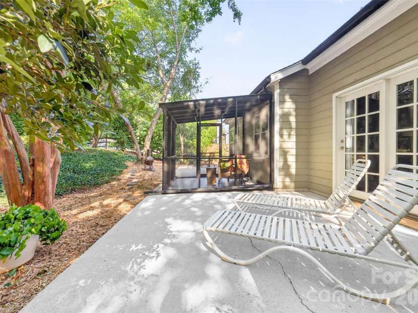 10316 Bon Meade Lane, Cornelius, NC 28031.  MLS# CAR4395622, YatesRealty ID 36425. Patio off primary suite