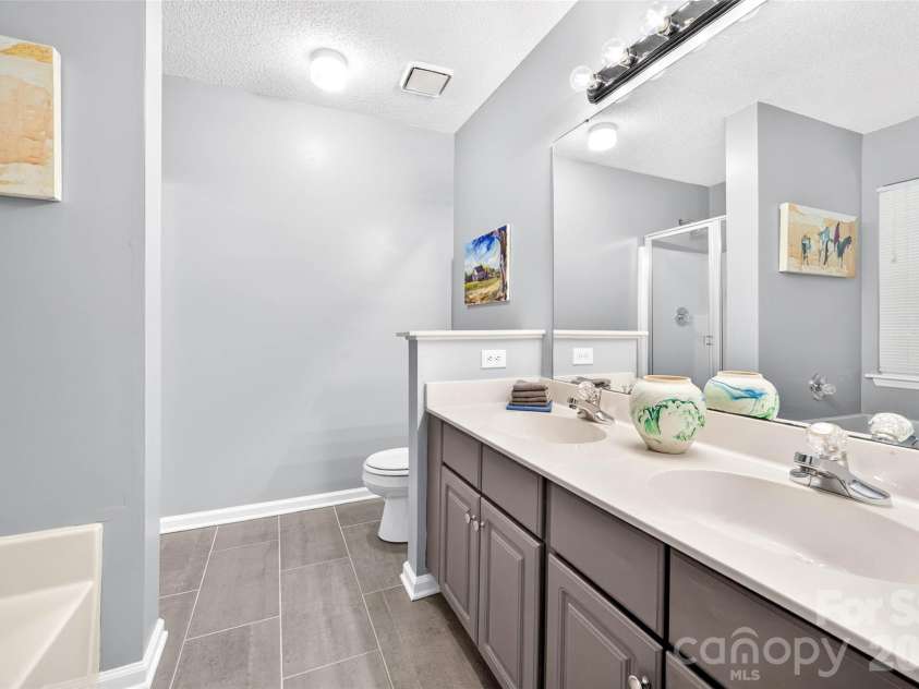 10316 Bon Meade Lane, Cornelius, NC 28031.  MLS# CAR4395622, YatesRealty ID 36425. Primary bathroom