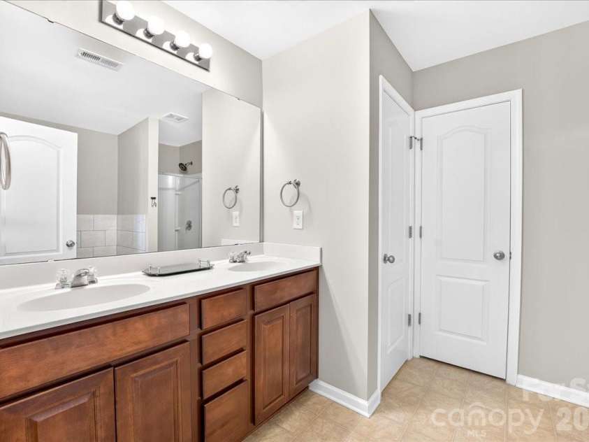 1019 Sunflower Lane, Indian Trail, NC 28079.  MLS# CAR4402543, YatesRealty ID 36431. Owner's suite bathroom