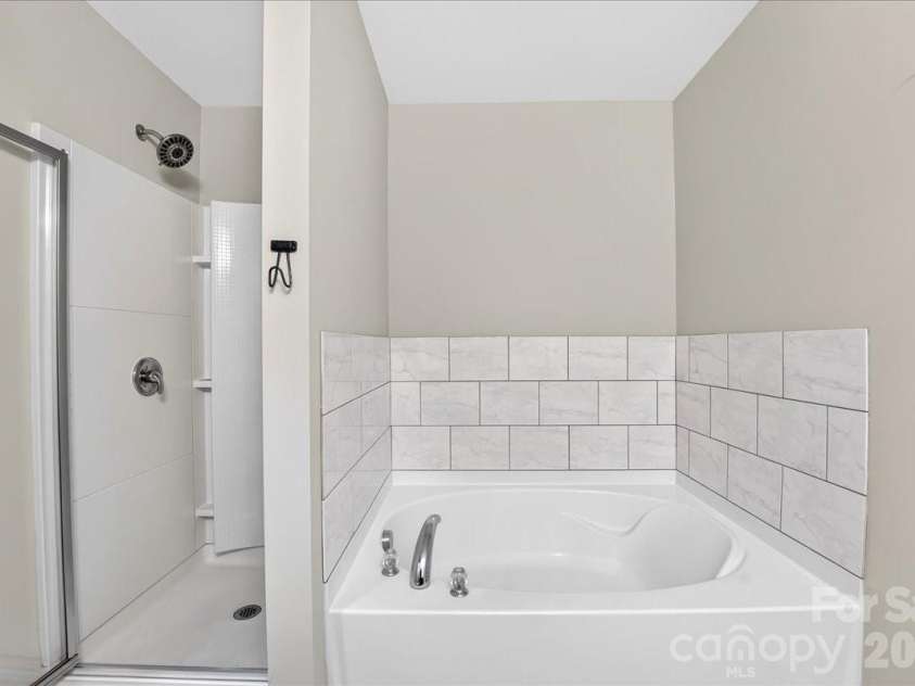 1019 Sunflower Lane, Indian Trail, NC 28079.  MLS# CAR4402543, YatesRealty ID 36431. Owner's suite bathroom