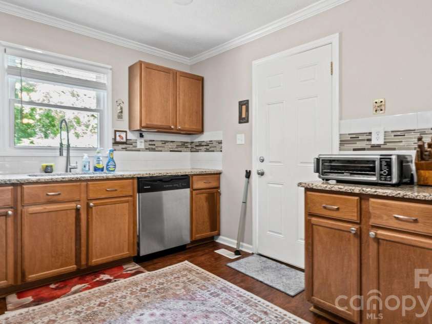 5313 Clearwater Lake Road, Mount Holly, NC 28120.  MLS# CAR4401872, YatesRealty ID 36432. Digitally Enhanced
