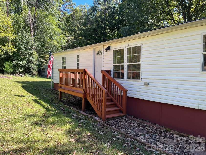 1785 Doe Court, Iron Station, NC 28080.  MLS# CAR4308568, YatesRealty ID 3644. Front deck and rear decks were rebuilt and stained in 2025