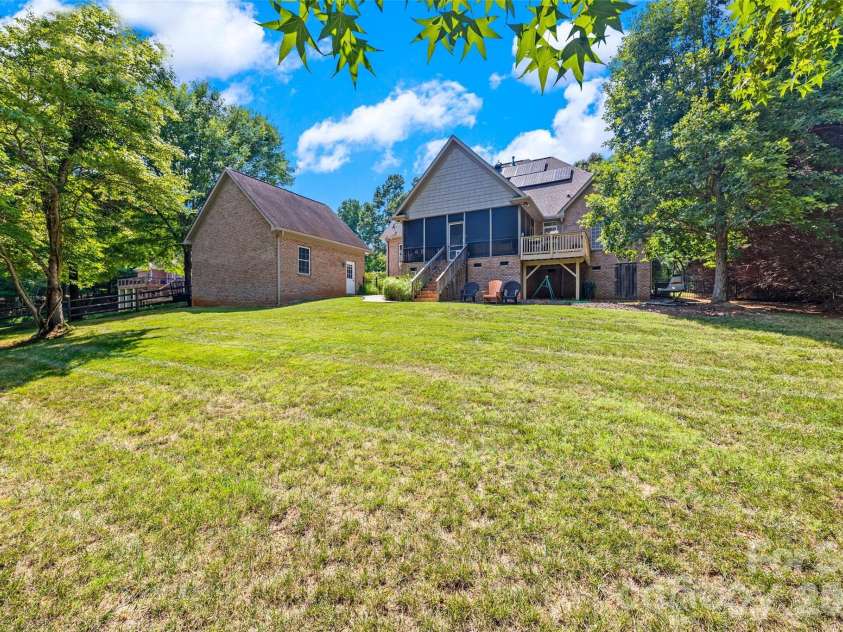 5864 Johnson Road, Clover, SC 29710.  MLS# CAR4401445, YatesRealty ID 36446. Over an acre, fenced flat yard