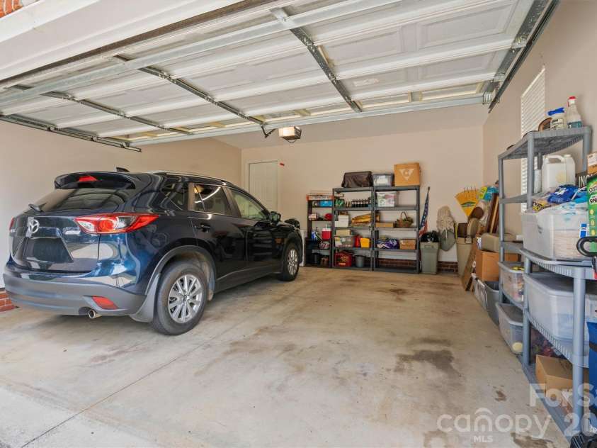 3656 Woodgreen Drive, Lincolnton, NC 28092.  MLS# CAR4403156, YatesRealty ID 36451. Focused 2 Car Garage View (Pull Down Attic Steps for Added Storage)