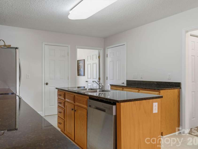 3656 Woodgreen Drive, Lincolnton, NC 28092.  MLS# CAR4403156, YatesRealty ID 36451. Focused Island/Formal Dining Entry View