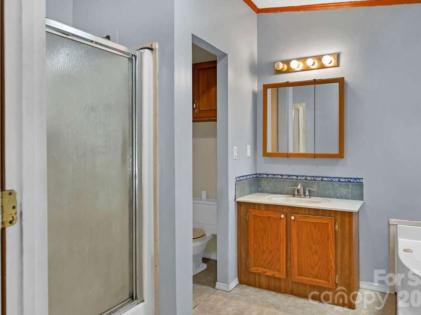 284 Paul Gosnell Road, Marshall, NC 28753.  MLS# CAR4400668, YatesRealty ID 36452. Master Bath