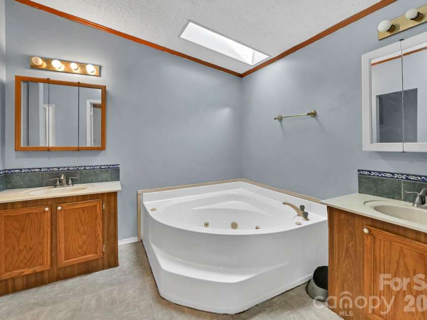 284 Paul Gosnell Road, Marshall, NC 28753.  MLS# CAR4400668, YatesRealty ID 36452. Master Bath