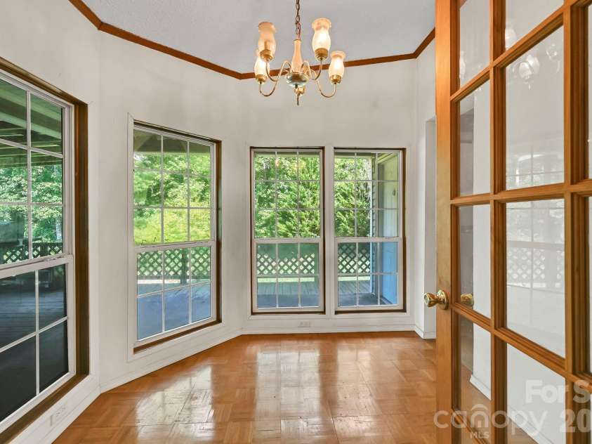 284 Paul Gosnell Road, Marshall, NC 28753.  MLS# CAR4400668, YatesRealty ID 36452. Sunroom