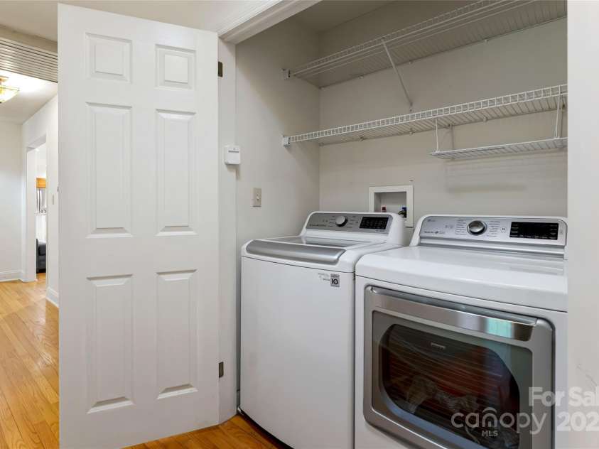 21 Westridge Drive, Asheville, NC 28803.  MLS# CAR4227775, YatesRealty ID 3646. Laundry Hall Closet