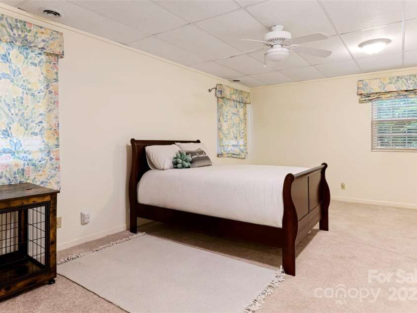 21 Westridge Drive, Asheville, NC 28803.  MLS# CAR4227775, YatesRealty ID 3646. Lower Level Bedroom