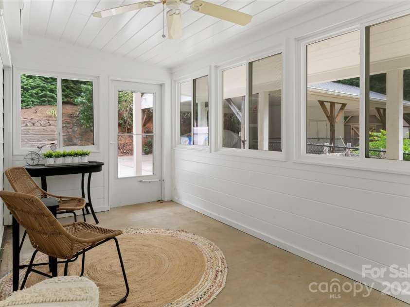 21 Westridge Drive, Asheville, NC 28803.  MLS# CAR4227775, YatesRealty ID 3646. Sunroom attached to primary bedroom