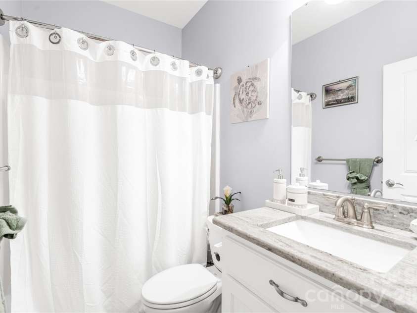 3605 Crow Road, Monroe, NC 28112.  MLS# CAR4347297, YatesRealty ID 3646. Bathroom downstais