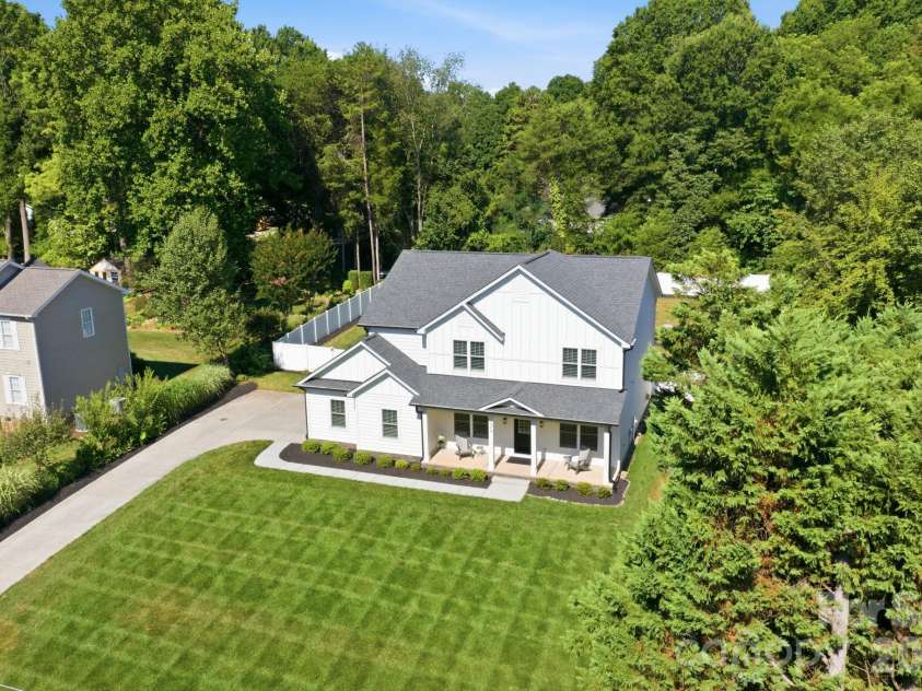 229 Elysian Drive, Mooresville, NC 28117.  MLS# CAR4430310, YatesRealty ID 36463. Septic system located in front yard