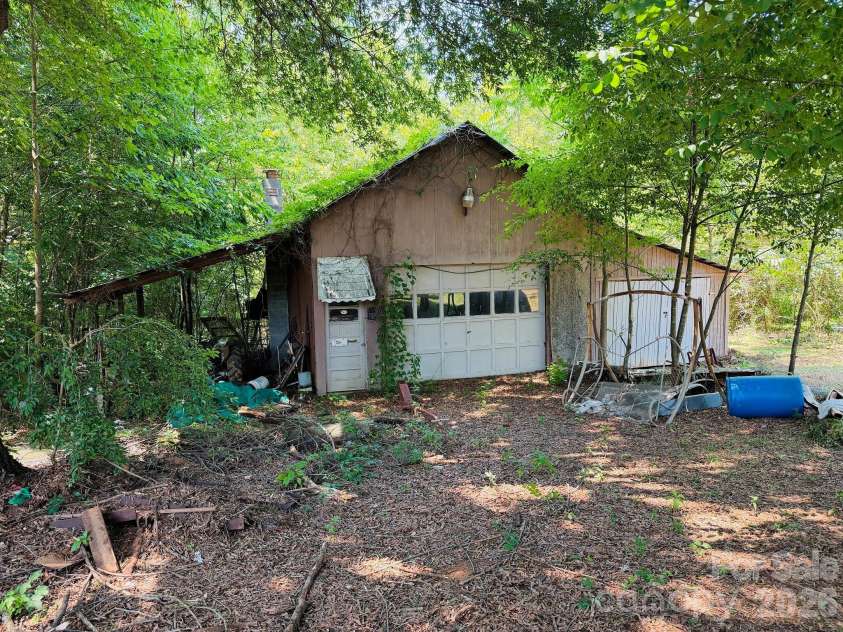 175 Westmoreland Road, Mooresville, NC 28115.  MLS# CAR4403128, YatesRealty ID 36471. Barn, tractor storage, and workshop
