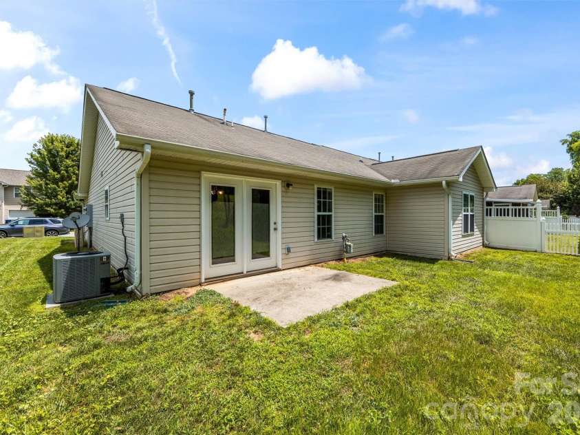 58 Lilac Fields Way, Arden, NC 28704.  MLS# CAR4403318, YatesRealty ID 36473. Back Patio off Dining Area