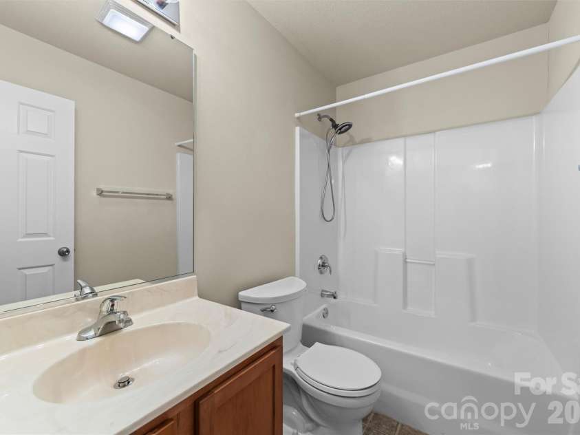 58 Lilac Fields Way, Arden, NC 28704.  MLS# CAR4403318, YatesRealty ID 36473. Guest Bathroom