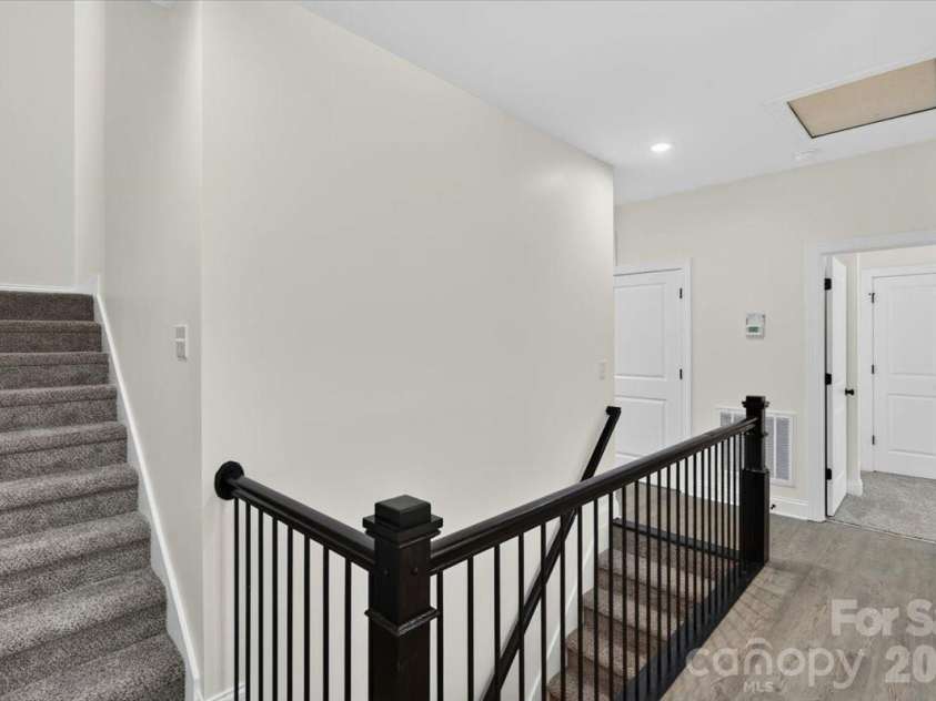 228 Hillside Avenue, Concord, NC 28025.  MLS# CAR4402795, YatesRealty ID 36476. Hallway to Upstairs