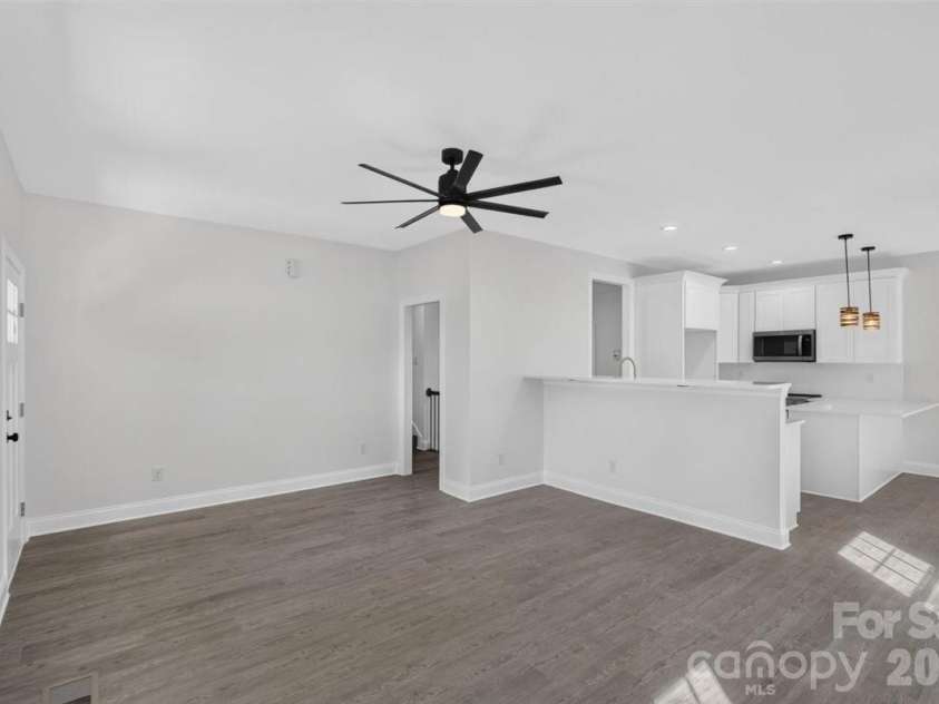 228 Hillside Avenue, Concord, NC 28025.  MLS# CAR4402795, YatesRealty ID 36476. Living and Kitchen