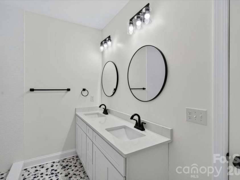 228 Hillside Avenue, Concord, NC 28025.  MLS# CAR4402795, YatesRealty ID 36476. Spa-Inspired Primary Bathroom